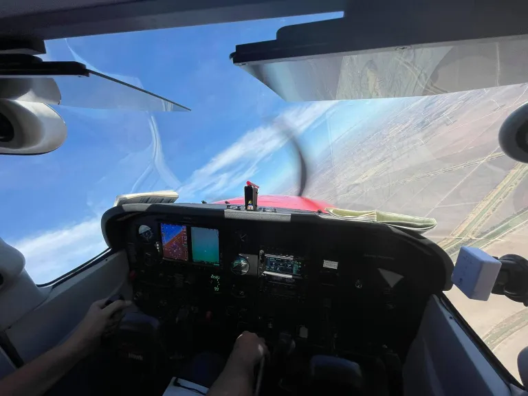 Certified flight instructor teaching a student pilot at Valley Wings Flight School in Harlingen, Texas